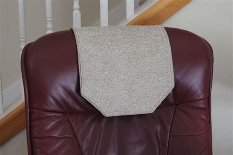 brown leather chair   white  grey cushion  top      stair case