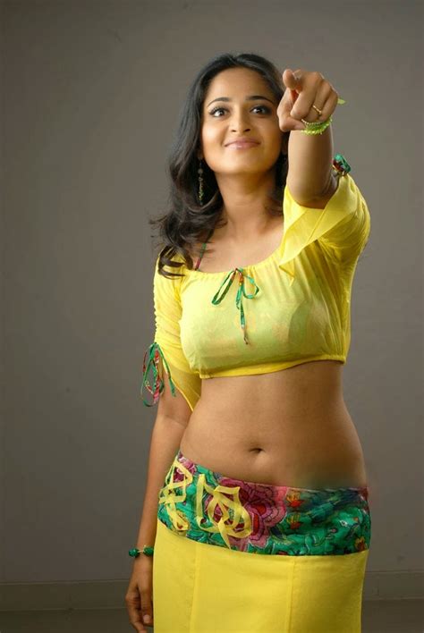 anushka shetty navel show in yellow dress photos film actress hot photos collections