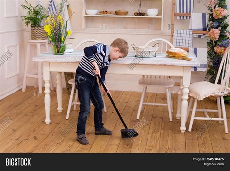 boy sweeping image photo  trial bigstock