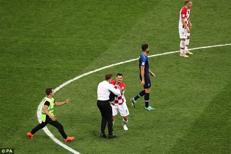 Dejan Lovren Floors Pussy Riot Pitch Invader During World Cup Final