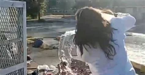 Homeless Woman Gets Water Poured On Her As Store Worker Yells Move And