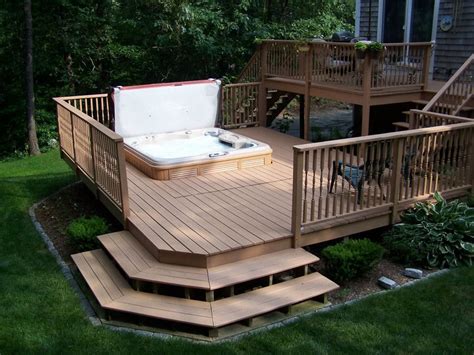 hot tub sitting  top   wooden deck