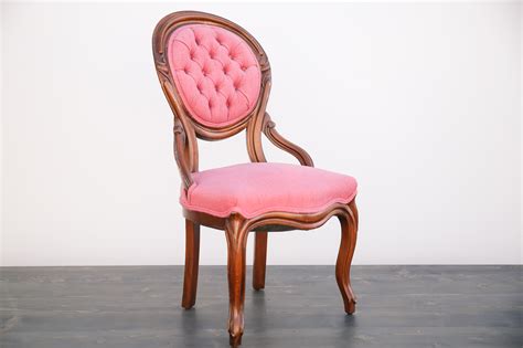 button tufted pink chair    dust rentals