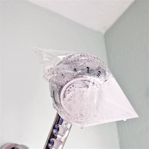 how to clean your showerhead popsugar smart living