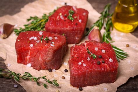 raw beef steak  rosemary thyme  garlic stock photo  image  istock