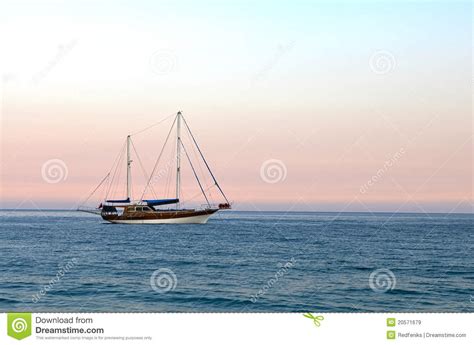 yacht  sunset stock image image  background sailboat