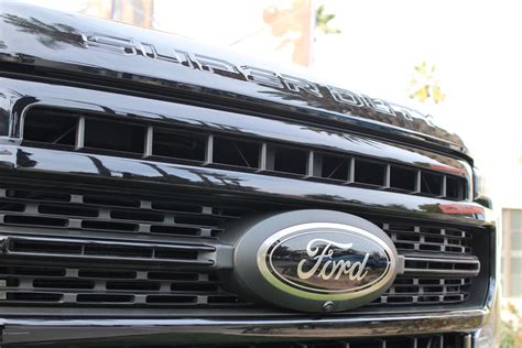 black ford oval    ford super duty lariat sport