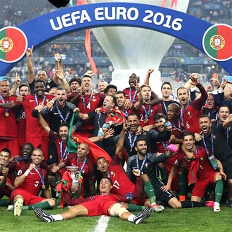 portugal teammates posing  euro  trophy  winning euro  final match portugals