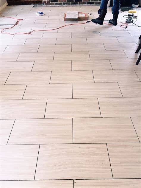 direction   run  tile flooring  designed