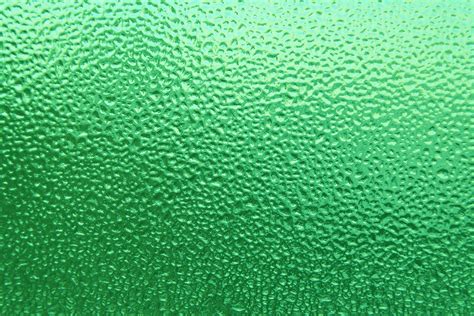 dimpled ice  glass texture colorized green picture  photograph