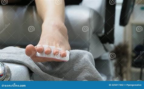 foot spa woman bare feet massaging  soap water machine  spa shop