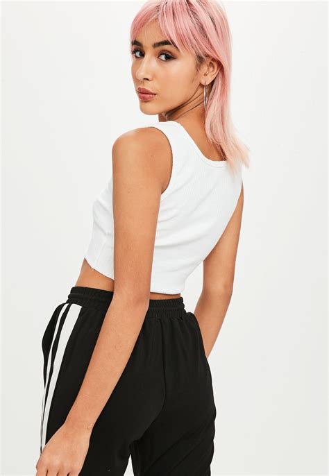 lyst missguided white sleeveless crop top in white