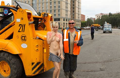 shameless blonde gives touch her tits to worker at public square russian sexy girls