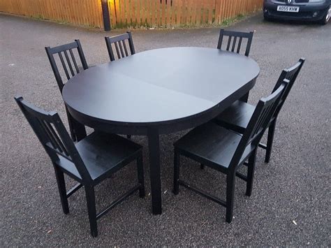 ikea  black extending table  stefan chairs  delivery