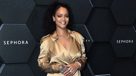 rihanna subverts the trench coat not once but twice vogue