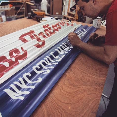sign writing   corrugated iron  london sign makers goodwin
