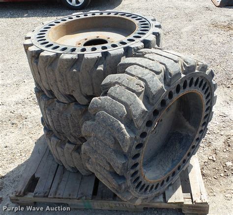 mitl solid flex   skid steer tires  roseville mn item dt sold purple wave