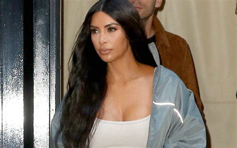 Kim Kardashian Debuts Clear Yeezy Cinderalla Heels Footwear News
