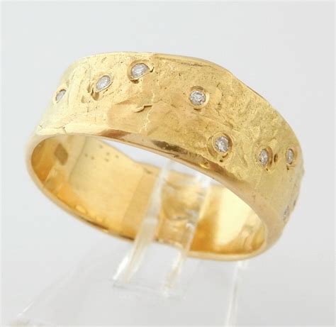 brede  karaat gouden design ring met  diamanten juwelenwereld