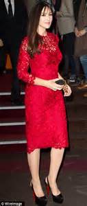 a radiant monica bellucci wears a fitted lace dress to the
