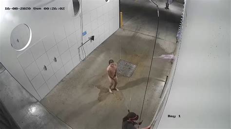 naked man goes for late night shower at a queensland car