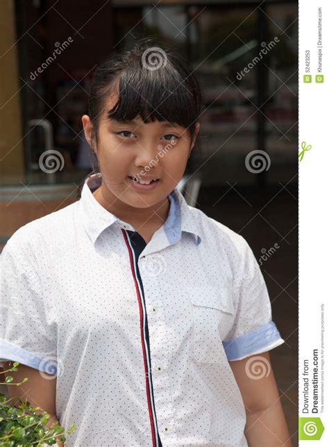 Face Of Asian Teen Aged Standing With Smiling Face Stock