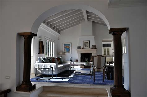 Interior Design With Massive Columns In Olive Wood