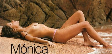 monica hoyos lying topless on a beach beach boobs
