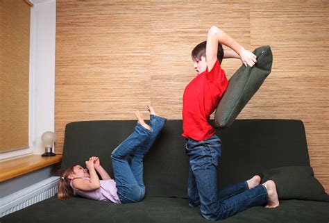 siblings  pillow fight stock photo  image  istock