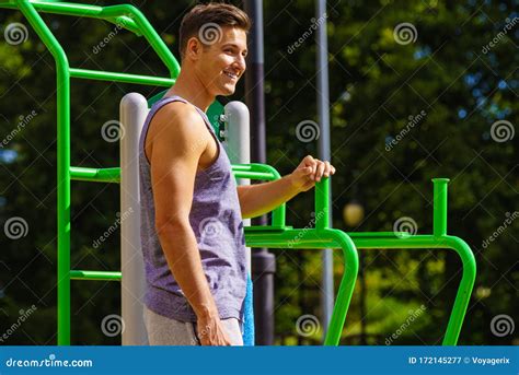 man working   outdoor gym stock image image  city public
