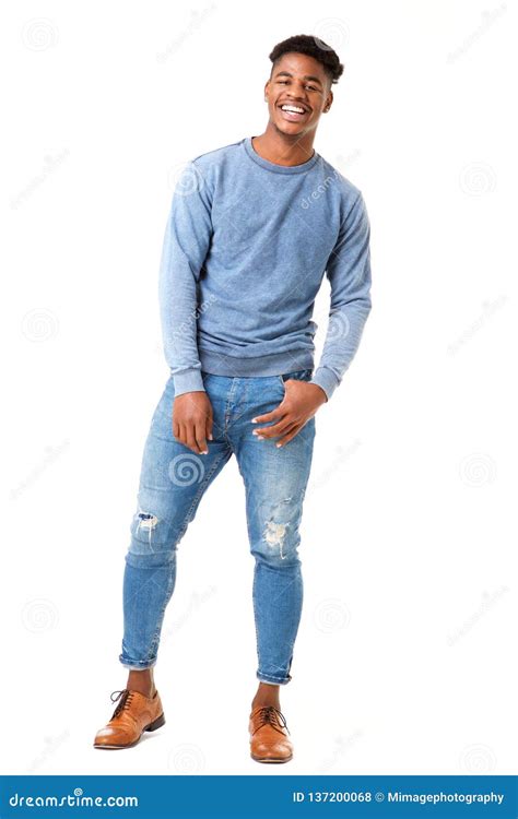 full body smiling young black man standing  isolated white background stock photo image