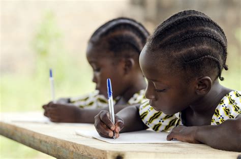 african children  school  homework african ethnicity students writing  essay