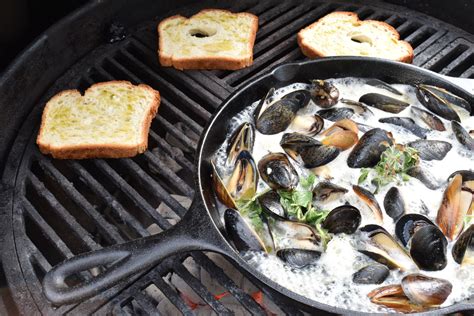 Cast Iron Grilled Mussels In A White Wine Bacon Herb Butter Sauce