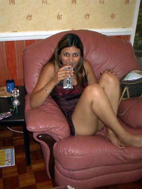 horny indian cutie taking off her miniskirt and black panties just to show her shaved twat