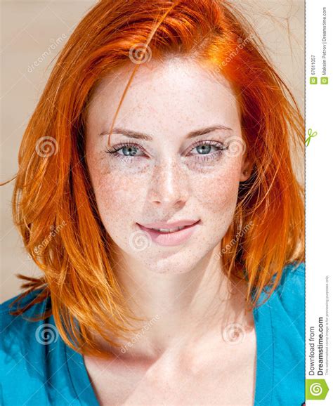 Beautiful Redhead Freckled Blue Eyed Woman Stock Image