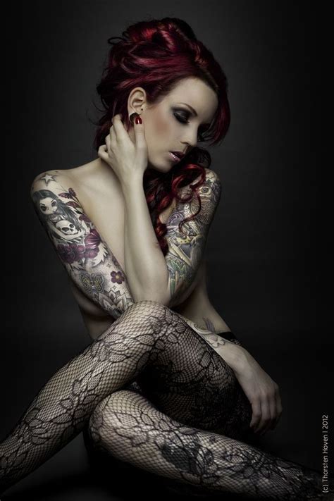 legs crossed stockings tattoos looking down to the side girl tattoos beauty tattoos inked