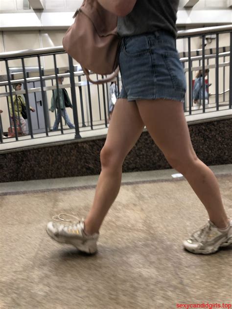 Girl With Hot Muscular Legs In Jeans Shorts Subway