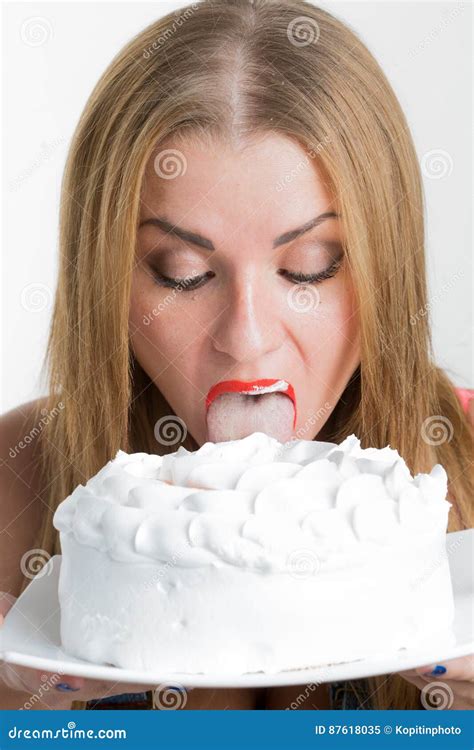 busty girl eating cake with whipped cream stock image image of happy