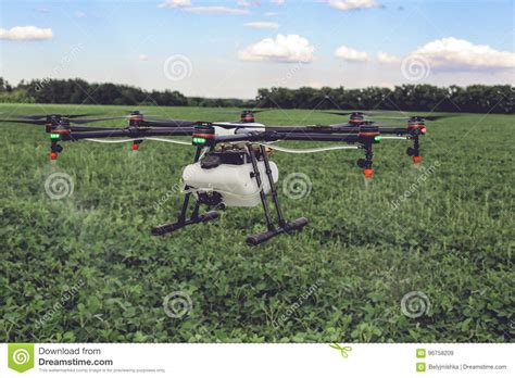 agriculture drone fly  sprayed fertilizer   green fields stock image image  aerial