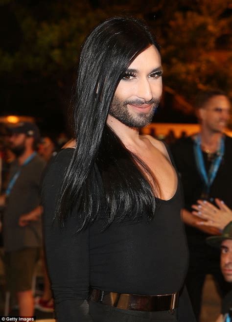 eurovision s conchita wurst attends sydney mardi gras in simple black jumpsuit daily mail online