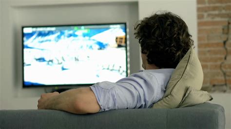 man finishes watching television  turns   stock video footage