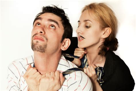 woman strangling  young man tie stock photo  image  strangling women adult