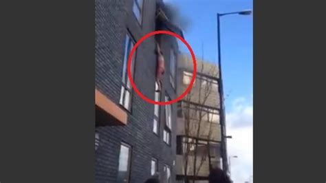 mulher pula de prédio para se salvar de incêndio na inglaterra vídeo