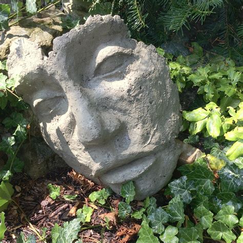 diy concrete face garden sculpture   barb art