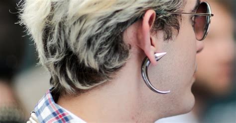gay ear piercing history significance  relevance today popsugar beauty