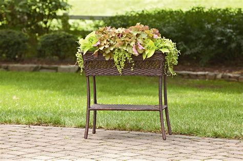 grand harbor wicker rectangle plant stand