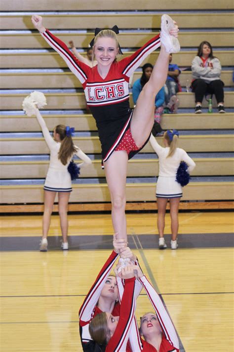 Beautiful Heel Stretch Cheerleaders Flyer Cute Cheerleaders Cute