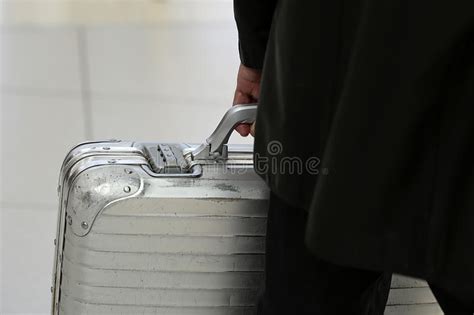 man carrying metallic security suitcase stock image image  container people