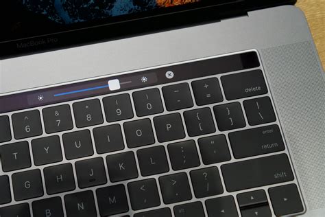 dells xps   brings  macbook touch bar  experience ars technica