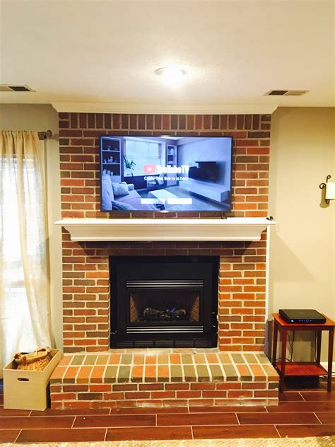 tv mounted   brick fireplace  lexington kentucky platinum audiovisual